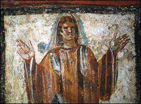 Catacomb in of Via Anapo, Rome. Orans or orante fresco, early Christian, mid-third century. This posture of arms lifted in prayer is found in thousands of figures in the catacombs.