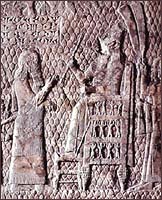 Detail of Sennacherib on his throne about 701 BC. From wall relief, 'Capitulation of Lachish in Palestine,' Southwest Palace of Sennacherib, Nineveh.