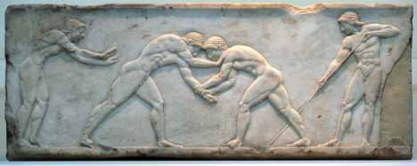 Wrestlers on the base of a funerary kouros found in Athens, built into the Themistokleian wall, 510 to 500 BC.
