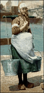 A Dutch milkmaid carrying buckets using a yoke