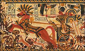 A painted box from Tutankhamen's tomb depicts the Pharaoh on a chariot chasing Nubians (1323 BC).