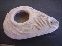 Byzantine period oil lamp, found in tomb in Samaria, village of Fandaqomiya (Pentacomia)