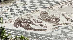 Dolphins in floor mosaic of the early Christian Basilica of Elounda, in northeastern Crete (4th to 5th century AD).